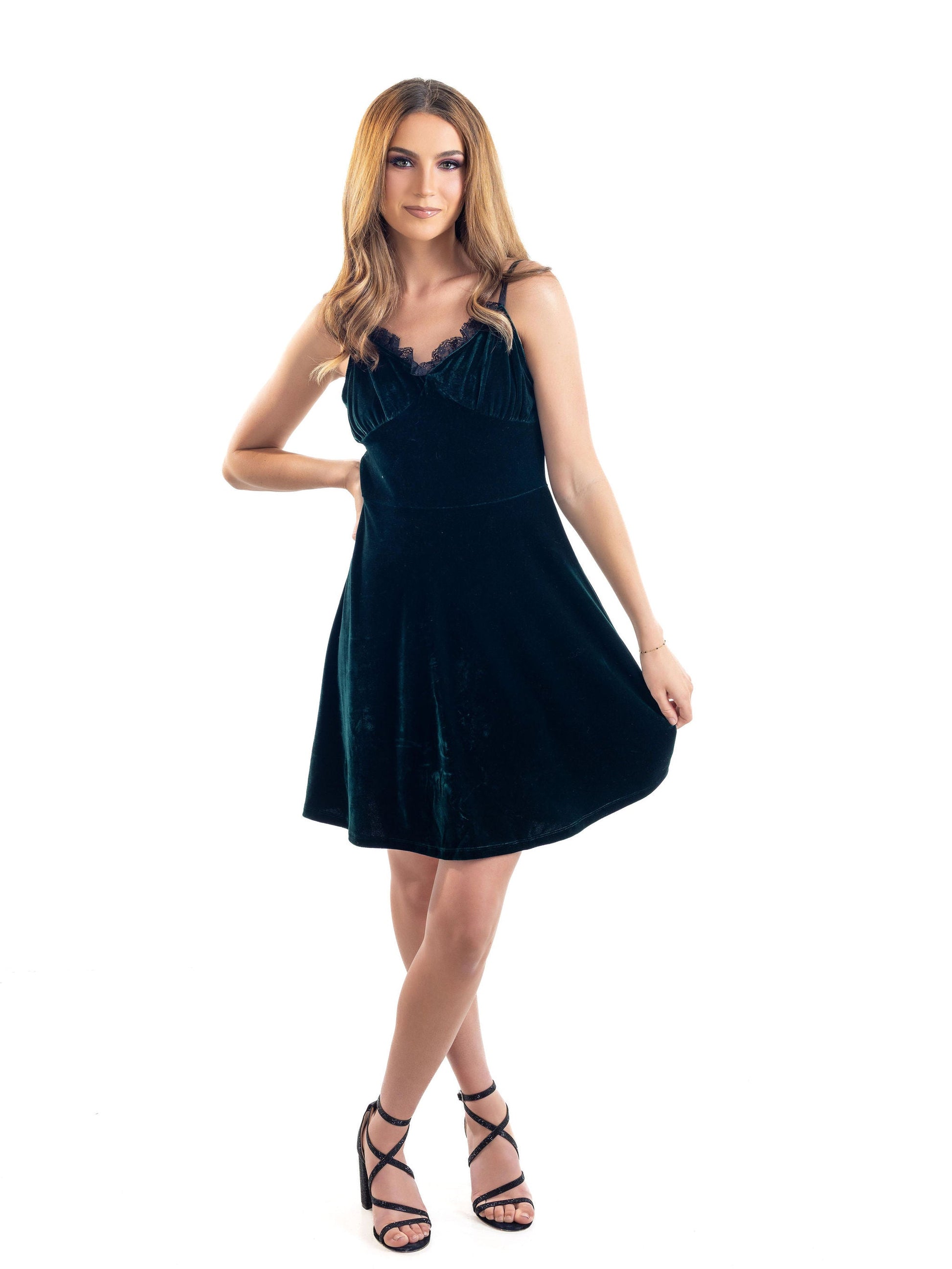 Olivia Noire Fashion gothic velvet slip dress in black with lace trim worn by model with strappy heels