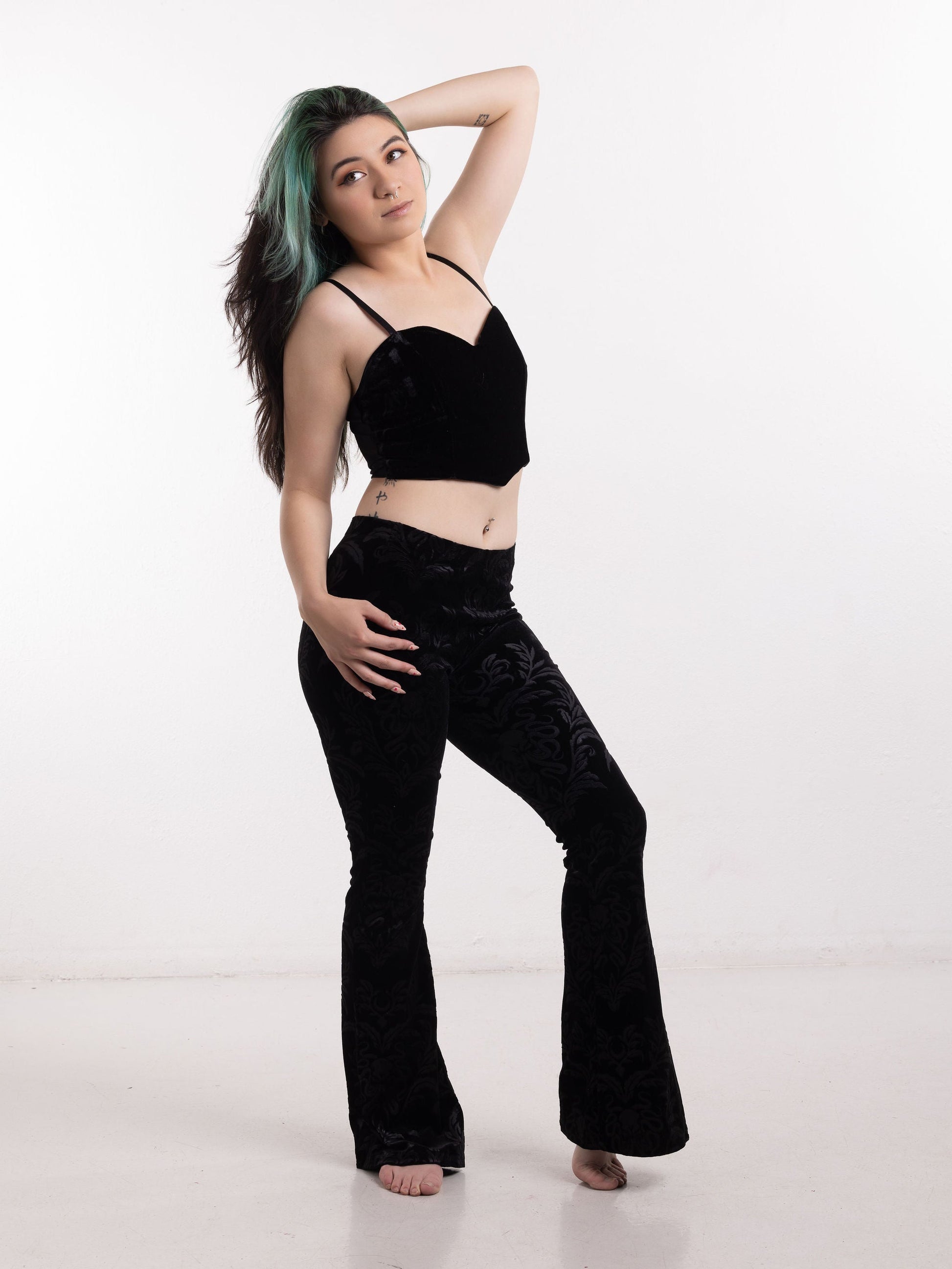 Olivia Noire model wearing a black gothic velvet cami with matching velvet pants